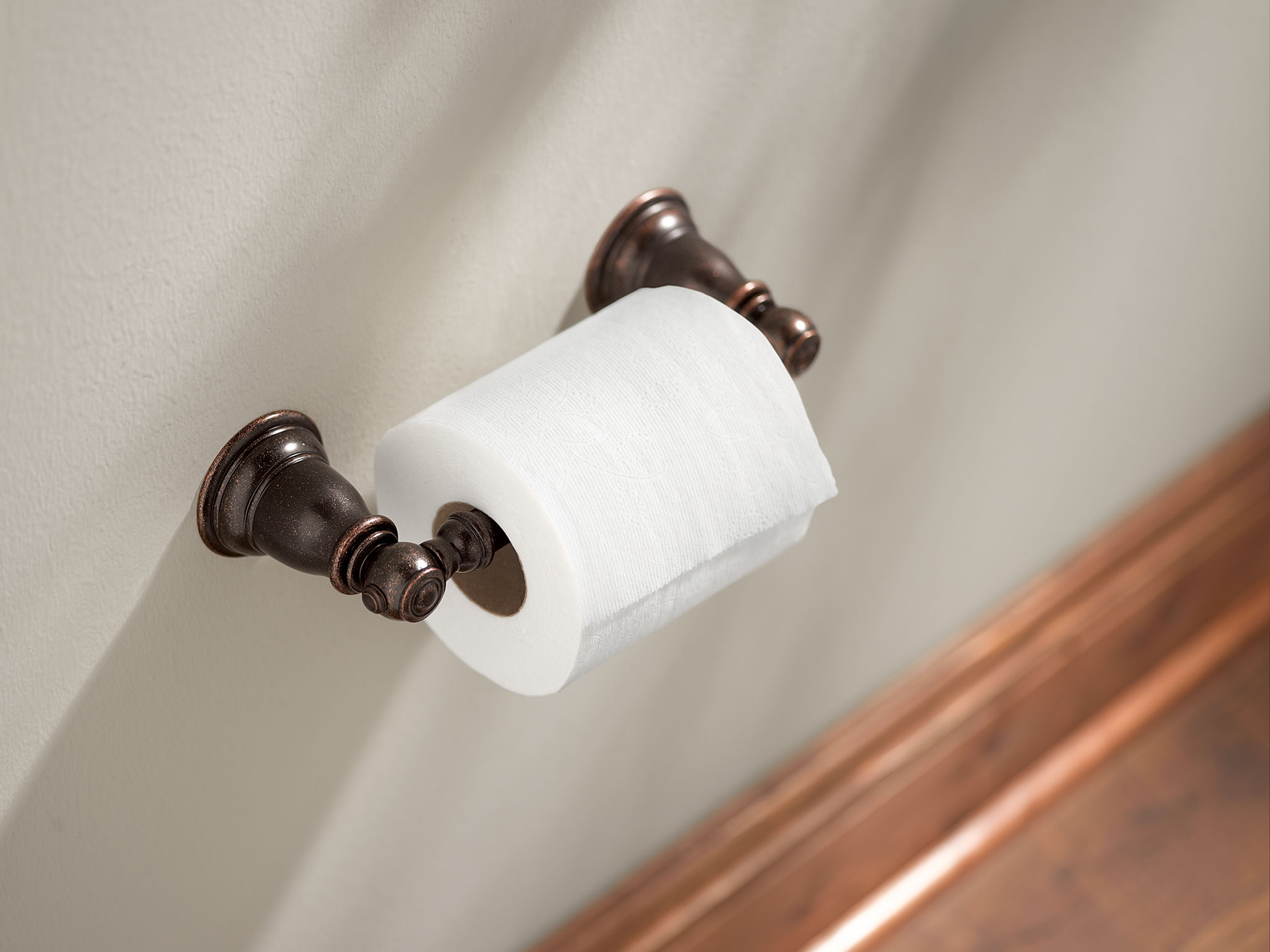 Kingsley Pivoting Toilet Paper Holder – Moen
